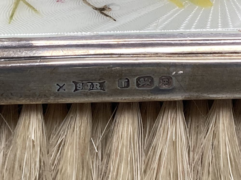 A 1950s silver and enamel five piece mirror and brush set, S.J Rose & Son, London, 1954.